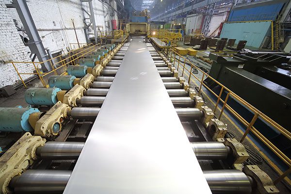 Image of metal rolling machine in steel mill industry factory